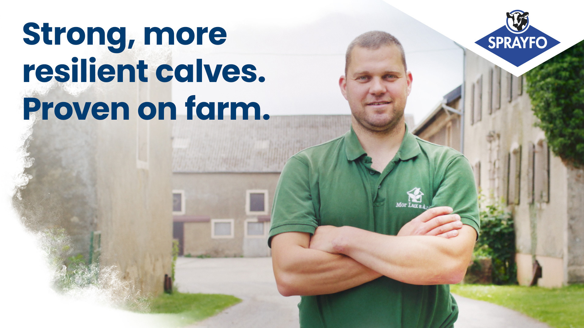 A happy farmer with his arms folded in front of a farm with text on top saying: Strong, more resilient calves. Proven on farm.